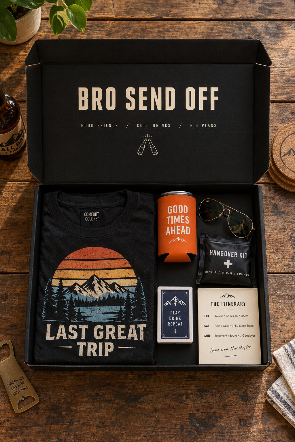 Open Bro Send Off box with a folded shirt, koozie, sunglasses, cards and recovery kit